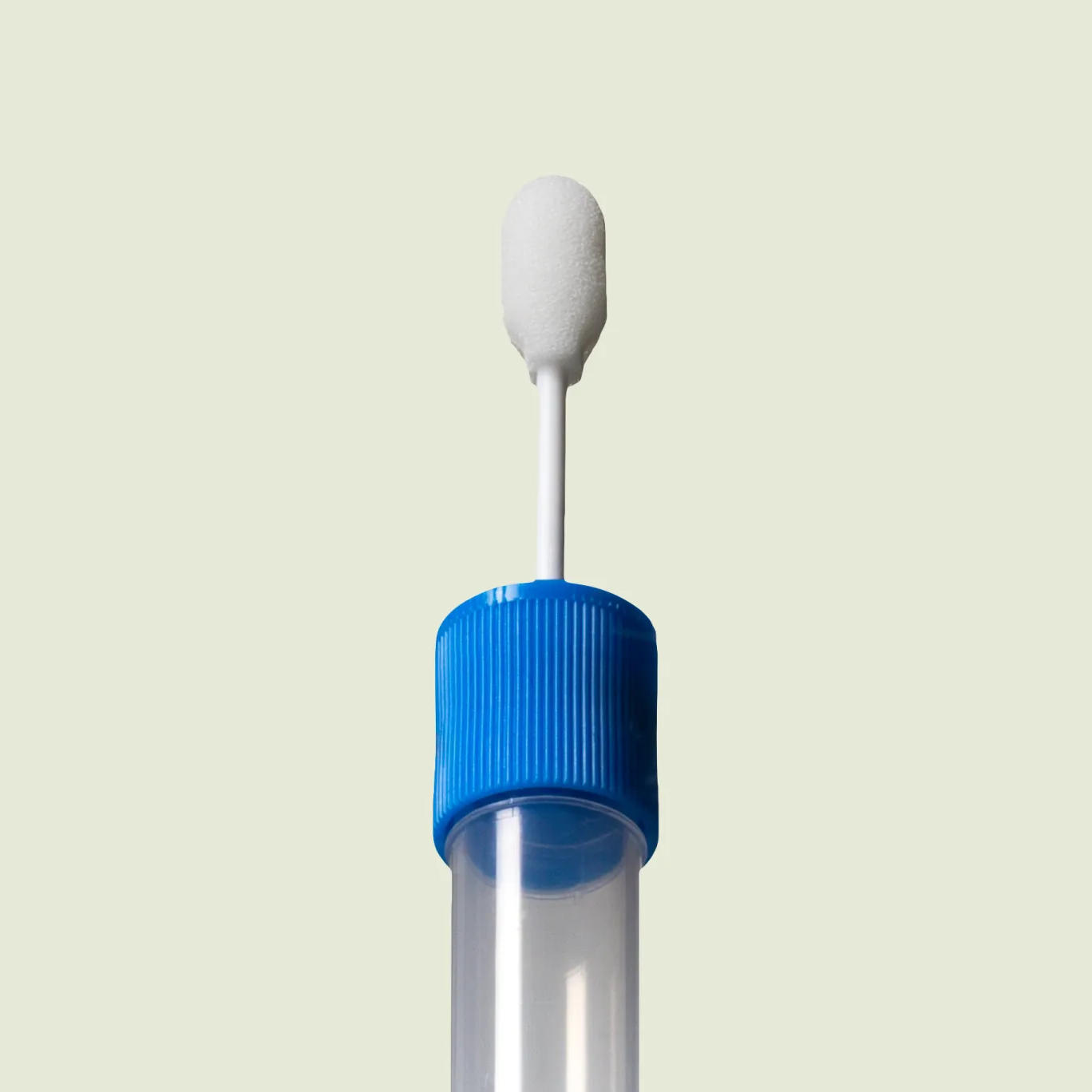 Test tube with blue cap and white swab on a beige background